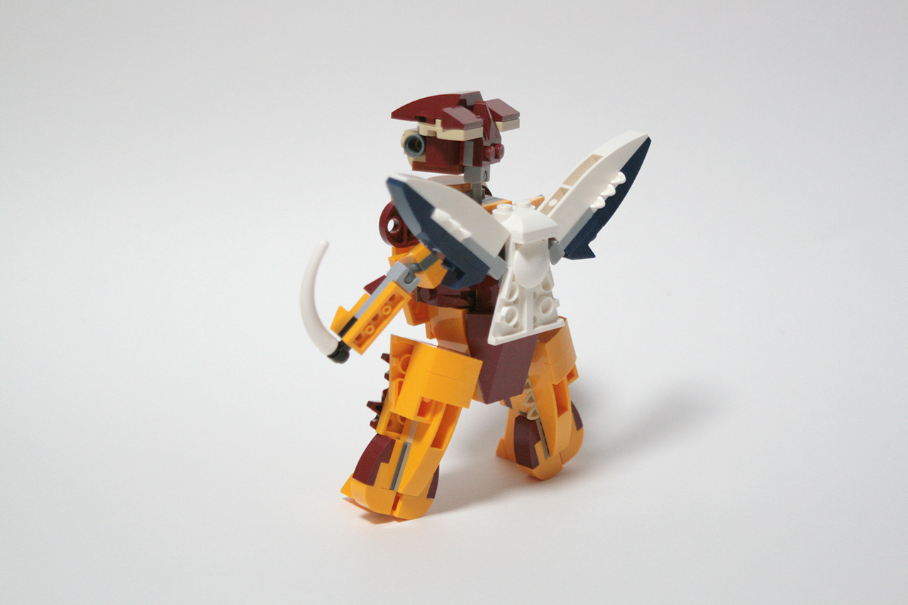 A back side photo of my custom LEGO build. It's an anthropomorphic bright light orange creature (or mech?) with brown details on the body and a brown hat. On its back there is a dark blue / white flying device with two bug-like wings. It holds two white blades made out of the long rib lego pieces in its hands.