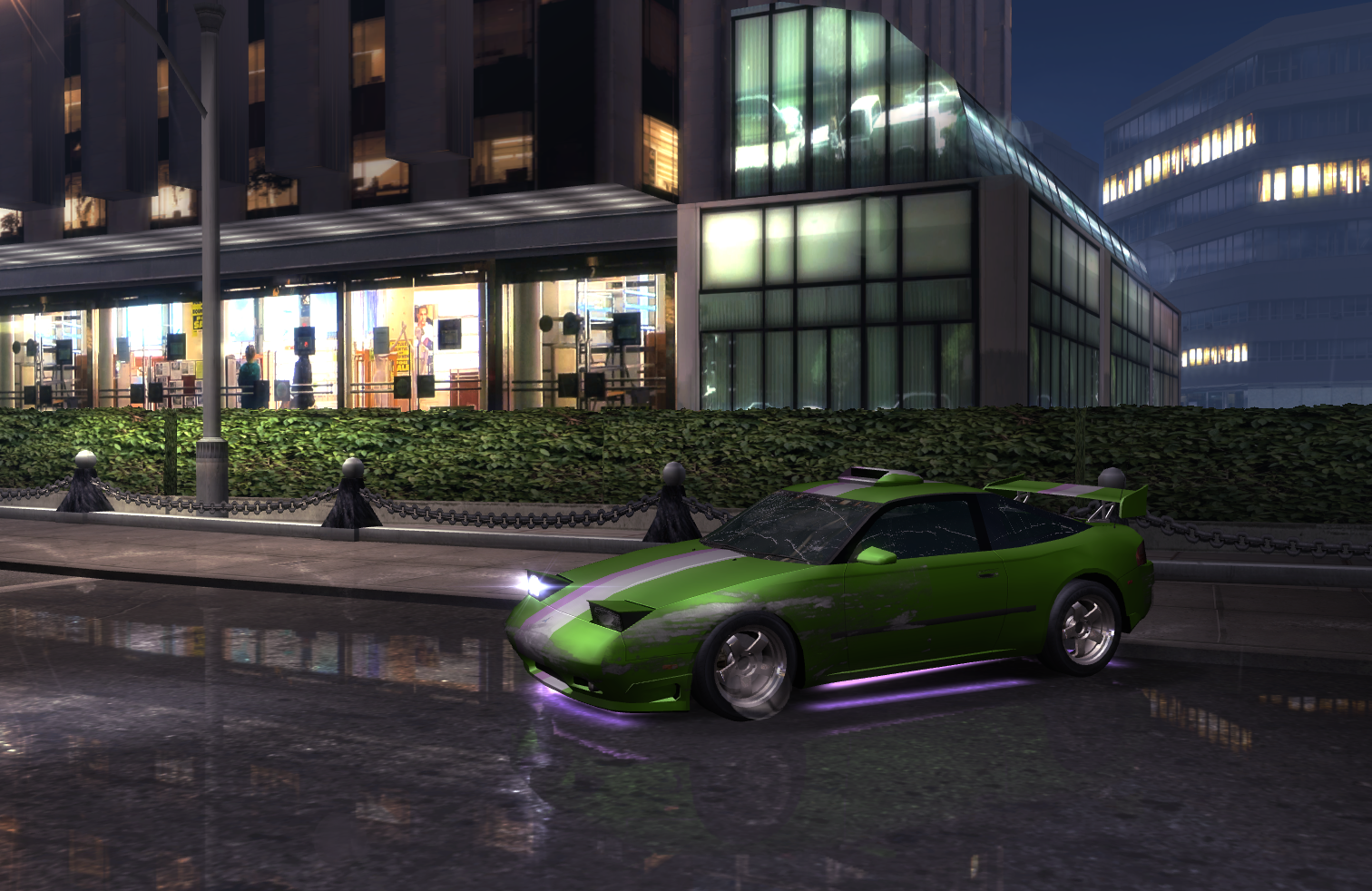 A video game screenshot of a green sport car with lilac neon lighting under the car body placed near some office buildings at night.